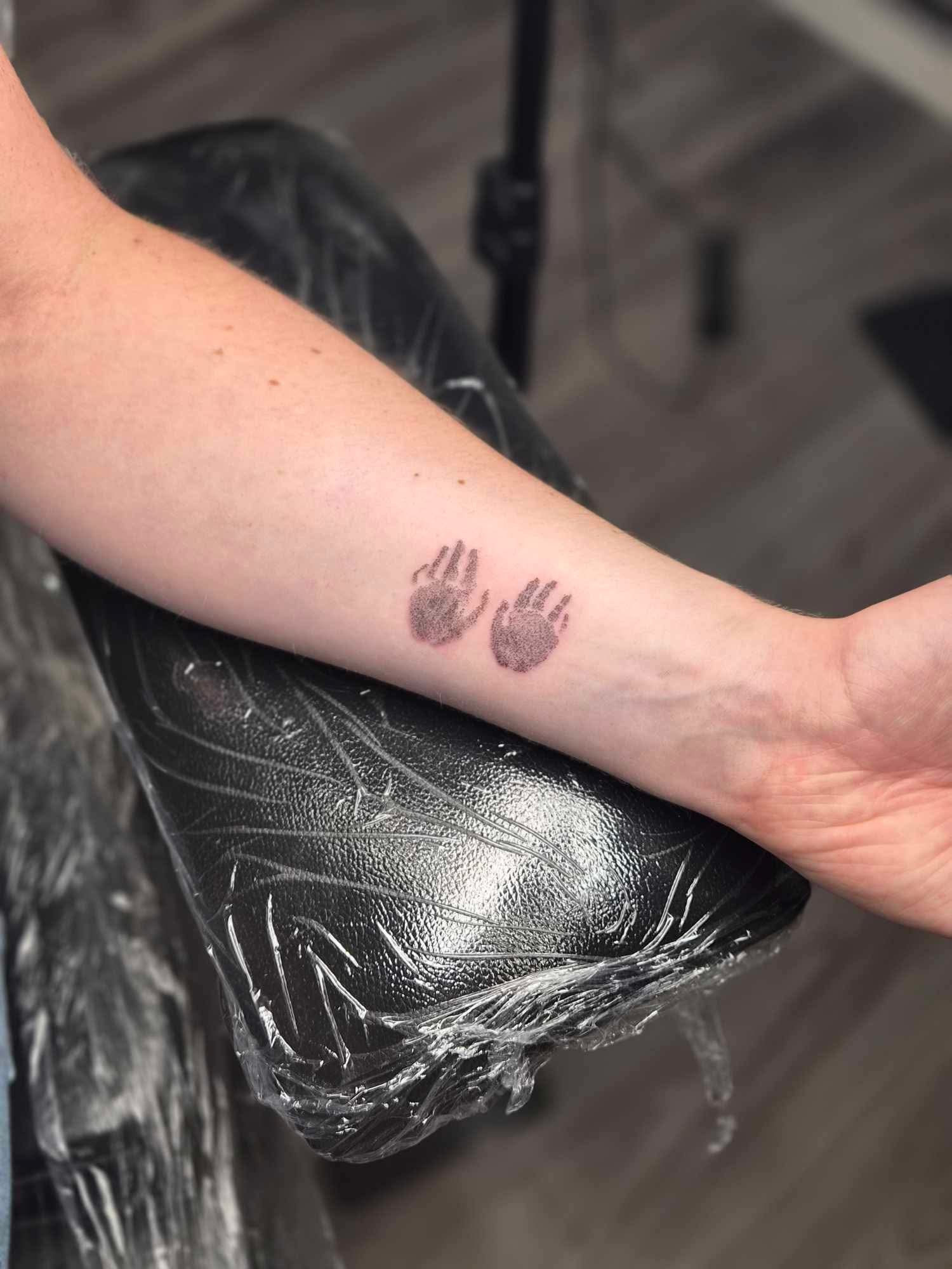 Faye’s tattoo of Esme’s hands after she was a second trimester loss.