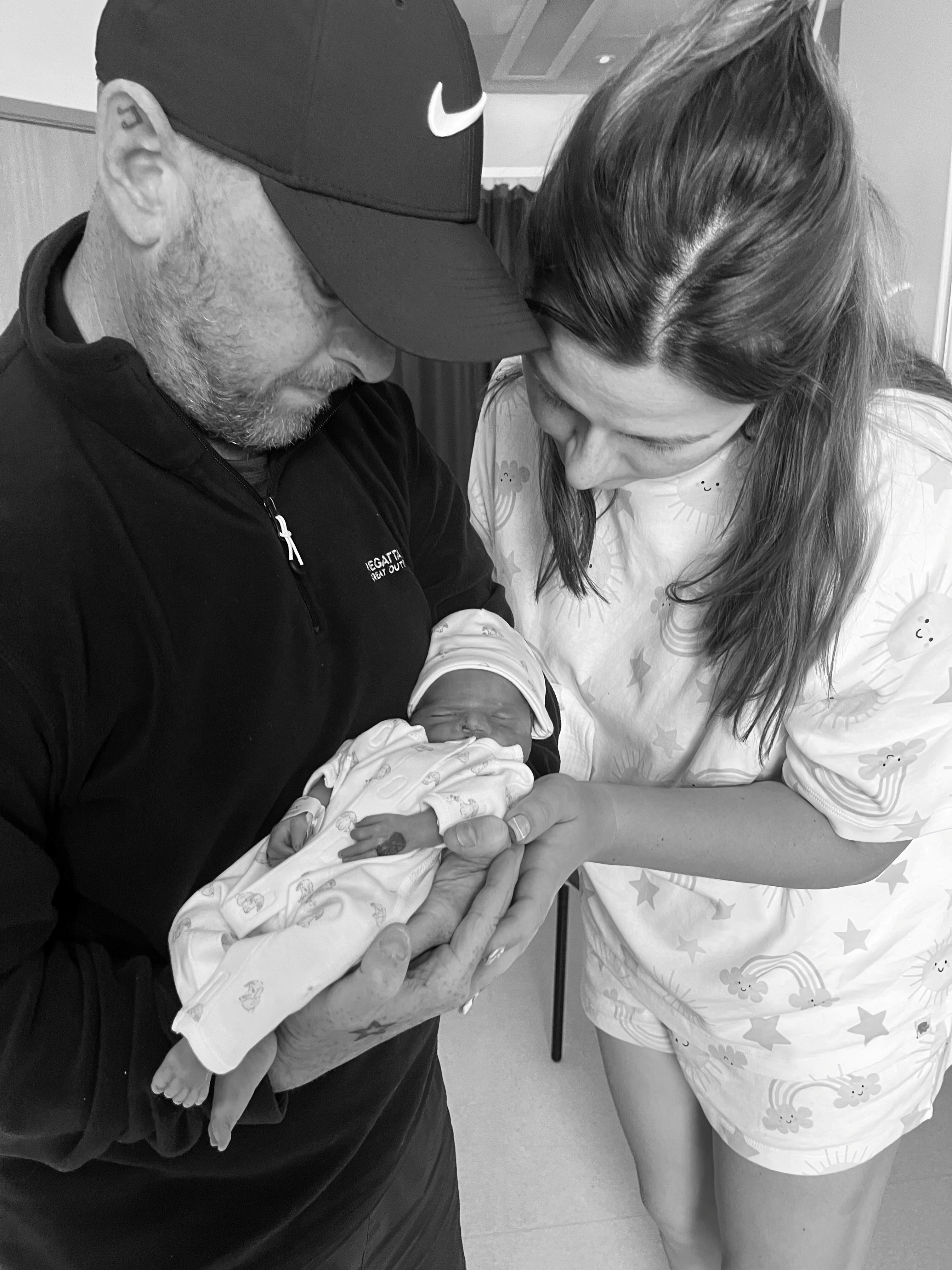 Jenny and her partner with their daughter Madison who was born sleeping and one of multiple losses.