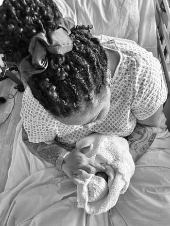 Alexis cuddling Sage following her 22 week miscarriage