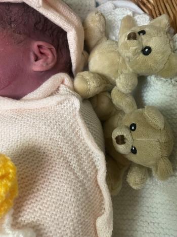 Alicia who was stillborn with bears from her Sands memory box.