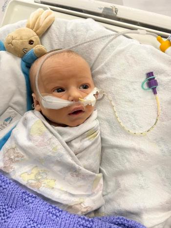  Baby Elias in hospital, who was a neonatal loss and passed away at three weeks after an undiagnosed heart condition. 
