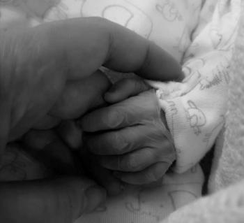 Leanne holding Arthur's hand