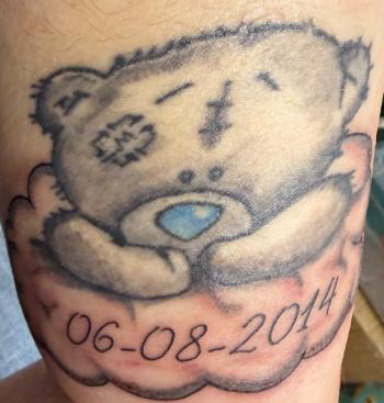 Phillippa’s tattoo in memory of her son Mason who was a stillbirth.