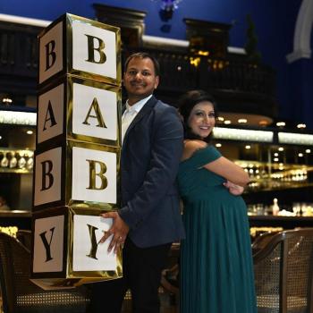 Selina and her husband at their baby shower before they had to have a Termination for Medical Reasons (TFMR).