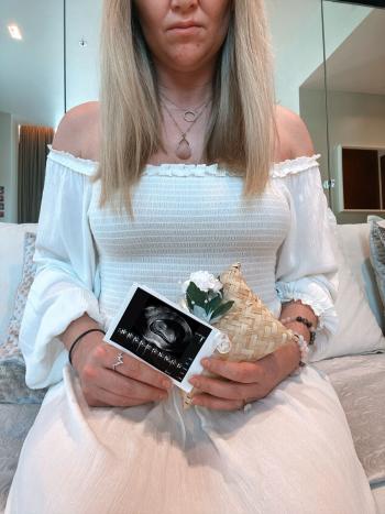 Emma with her scan picture