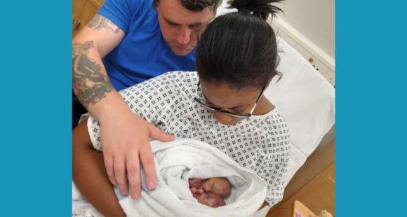 Image of Lauren, her husband and twin girls Grace and Yvette