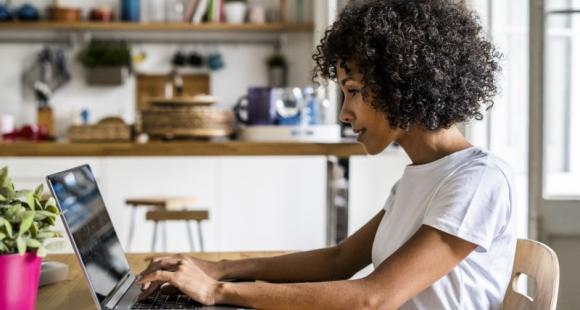 Image of woman using laptop to access Sands support