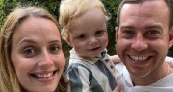 A lady with blonde hair, a little boy with blonde hair and a stripy shirt and a man with dark hair all smiling at the camera after discussing their PPROM experience.