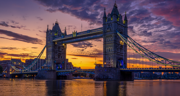 Image of Tower Bridge the river thames with dusk in the horizan