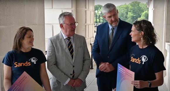 Finance Minister John O’Dowd and Health Minister Mike Nesbitt pictured with Sands volunteers Kelly Barnes and Rachel McGonigle at the launch of the consultation on a Baby Loss Certificate Scheme