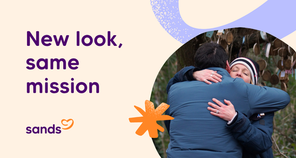 Photo of two Sands supporters hugging at a remembrance event and text "New look, same mission"