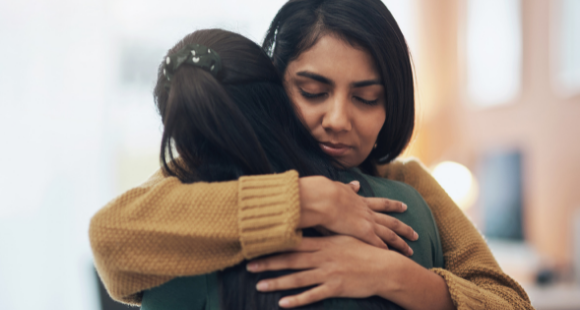 Women hugging