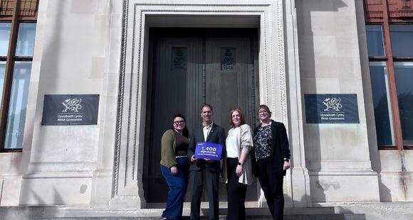 Parent campaigners hand in a petition to the Welsh Government (L-R parent campaigners Jazzmin Roberts, Daniel Lazenby, Ruth Mason, and Jess Reeves, Head of Public Affairs and Campaigns, Sands)