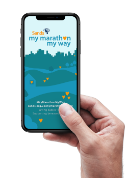 Hand holding a phone with a my marathon my way wallpaper saved 