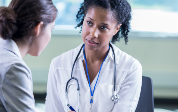 Image of doctor talking to a beareaved parent