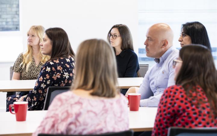 People listening to a Speech