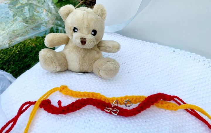 memory box bear with two Rakhis