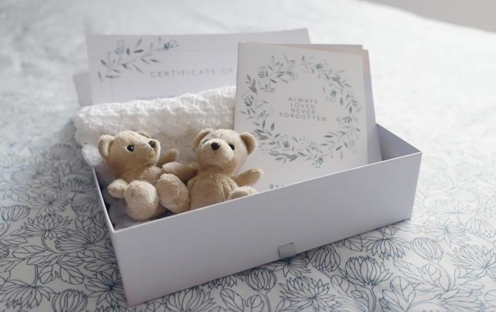 Sands Memory Box is displayed with its contents on show including teddy bears and a booklet