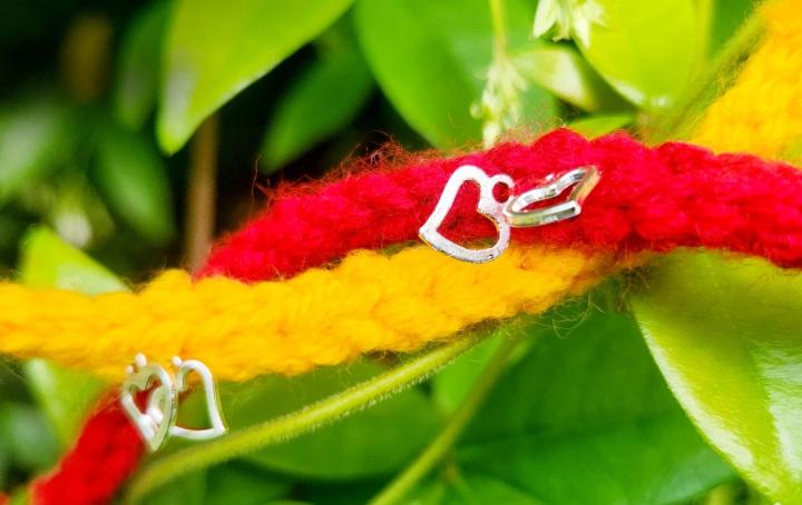 Red and yellow rakhis