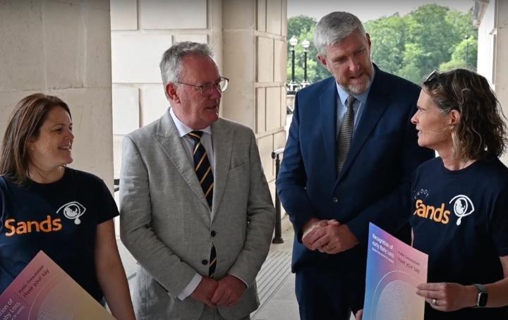 Finance Minister John O’Dowd and Health Minister Mike Nesbitt pictured with Sands volunteers Kelly Barnes and Rachel McGonigle at the launch of the consultation on a Baby Loss Certificate Scheme