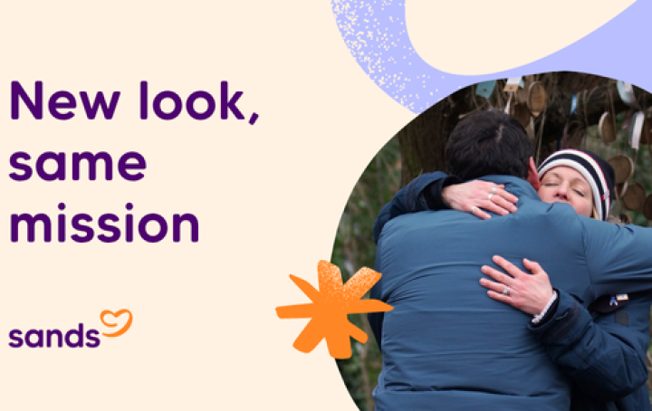 Photo of two Sands supporters hugging at a remembrance event and text "New look, same mission"