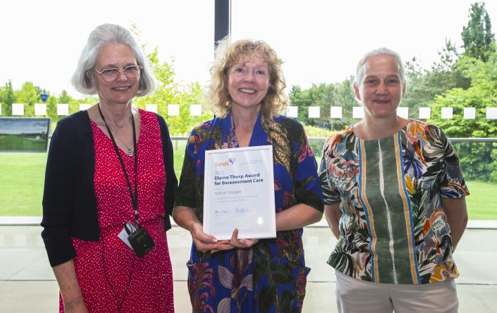Left to right: Sands CEO, Clea Harmer, stands next to Janine (winner of Elaine Thorp Award), and Lisa Brayshaw  (Chair of Elaine Thorp Award Panel)