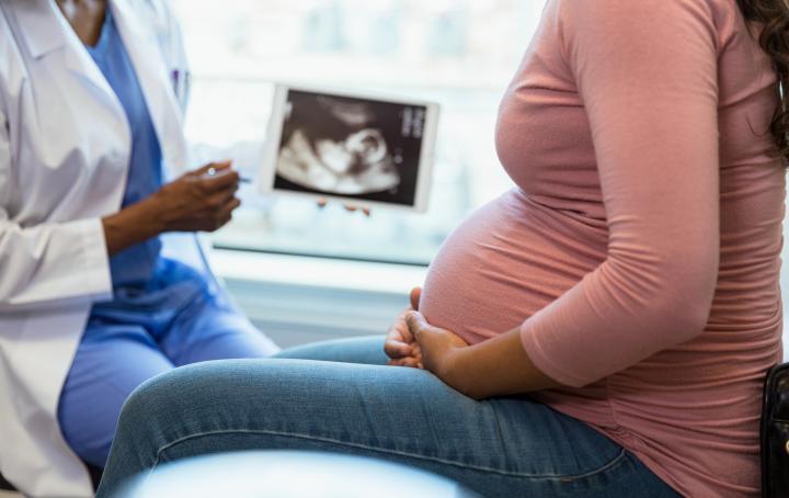 Health care worker and pregnant woman